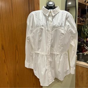 Bustier collared, long sleeve top.